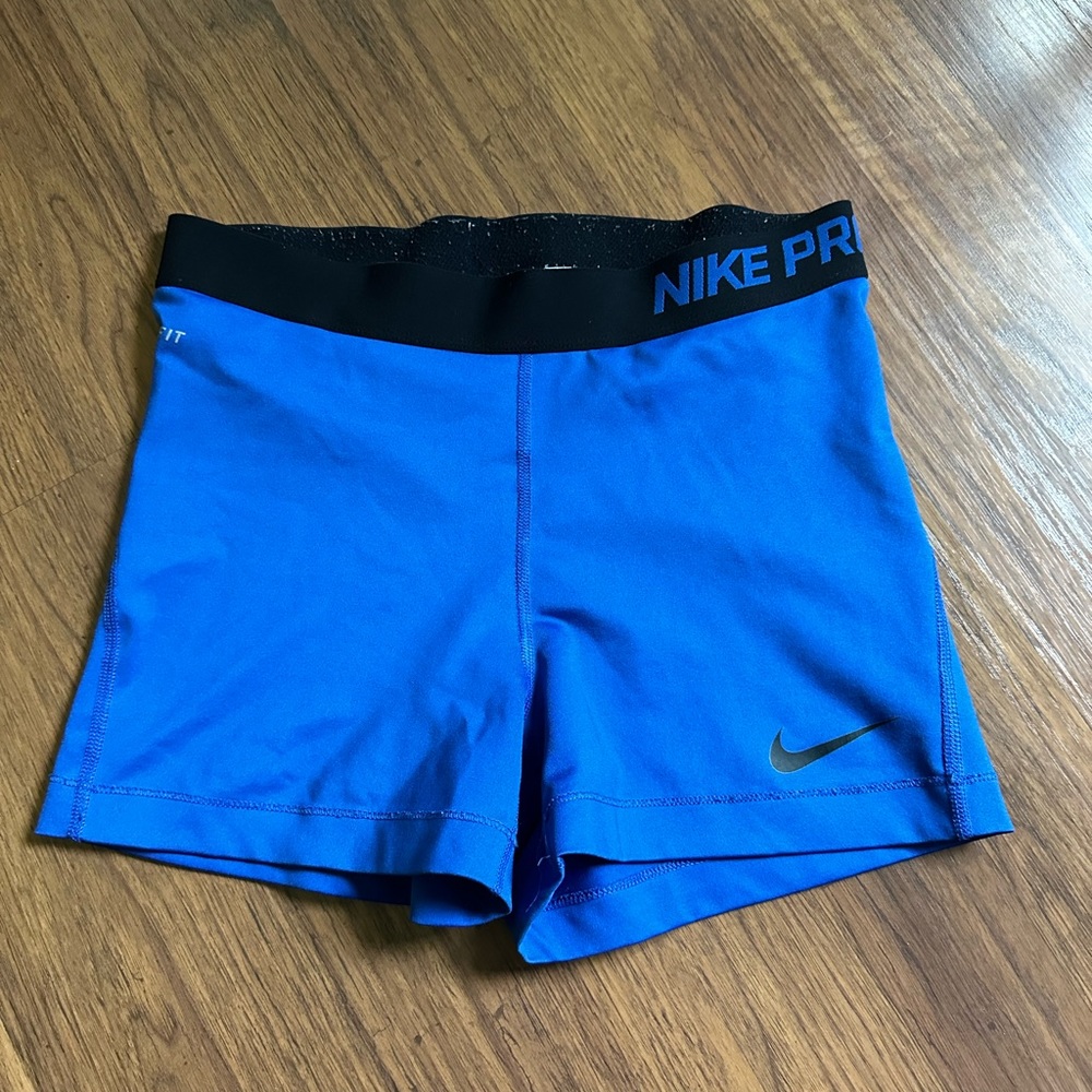 Blue Nike pros